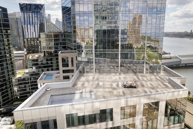 a view of a chairs and table in a terrace