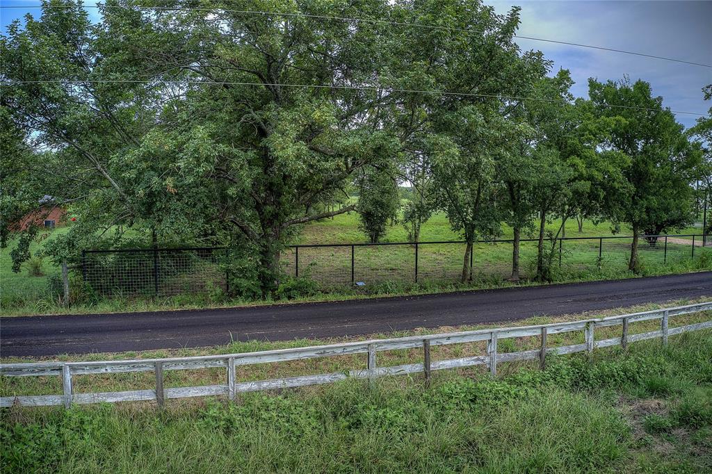 868 County Road 23940 Brookston, TX 75421 - Photo 6 of 29 a view of a yard