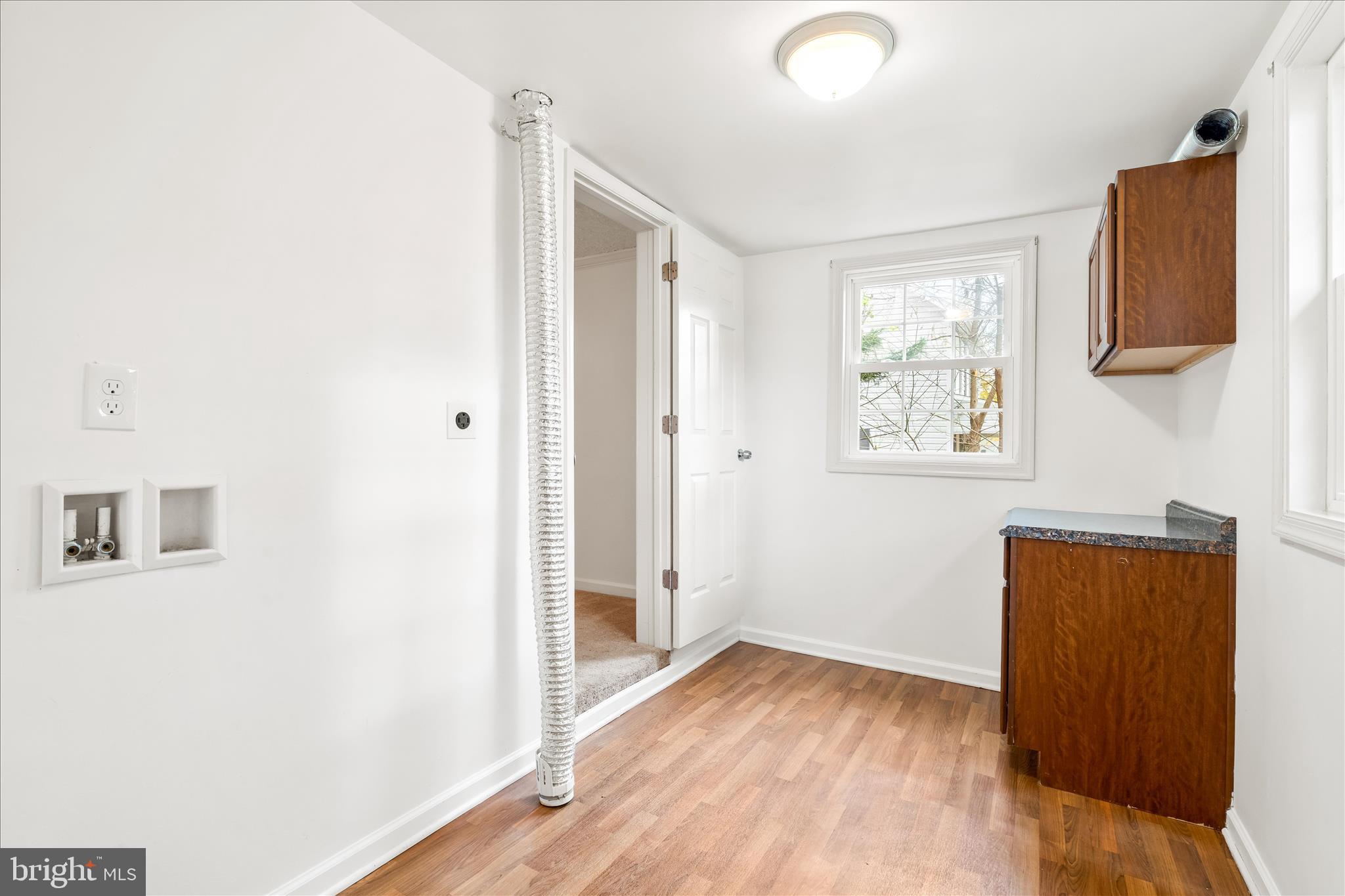 2060 Flag Marsh Road Mount Airy, MD 21771 - Photo 11 of 21 a view of empty room with wooden floor