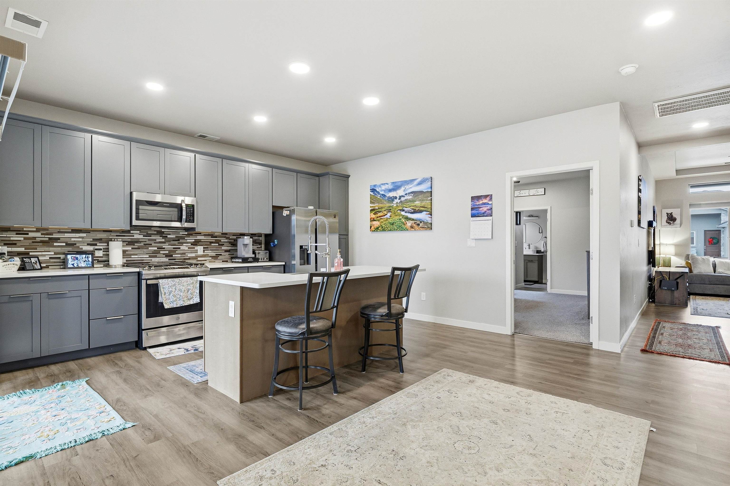 623 Thunder Ridge Drive Grand Junction, CO 81504 - Photo 22 of 40 a kitchen with a table and chairs in it