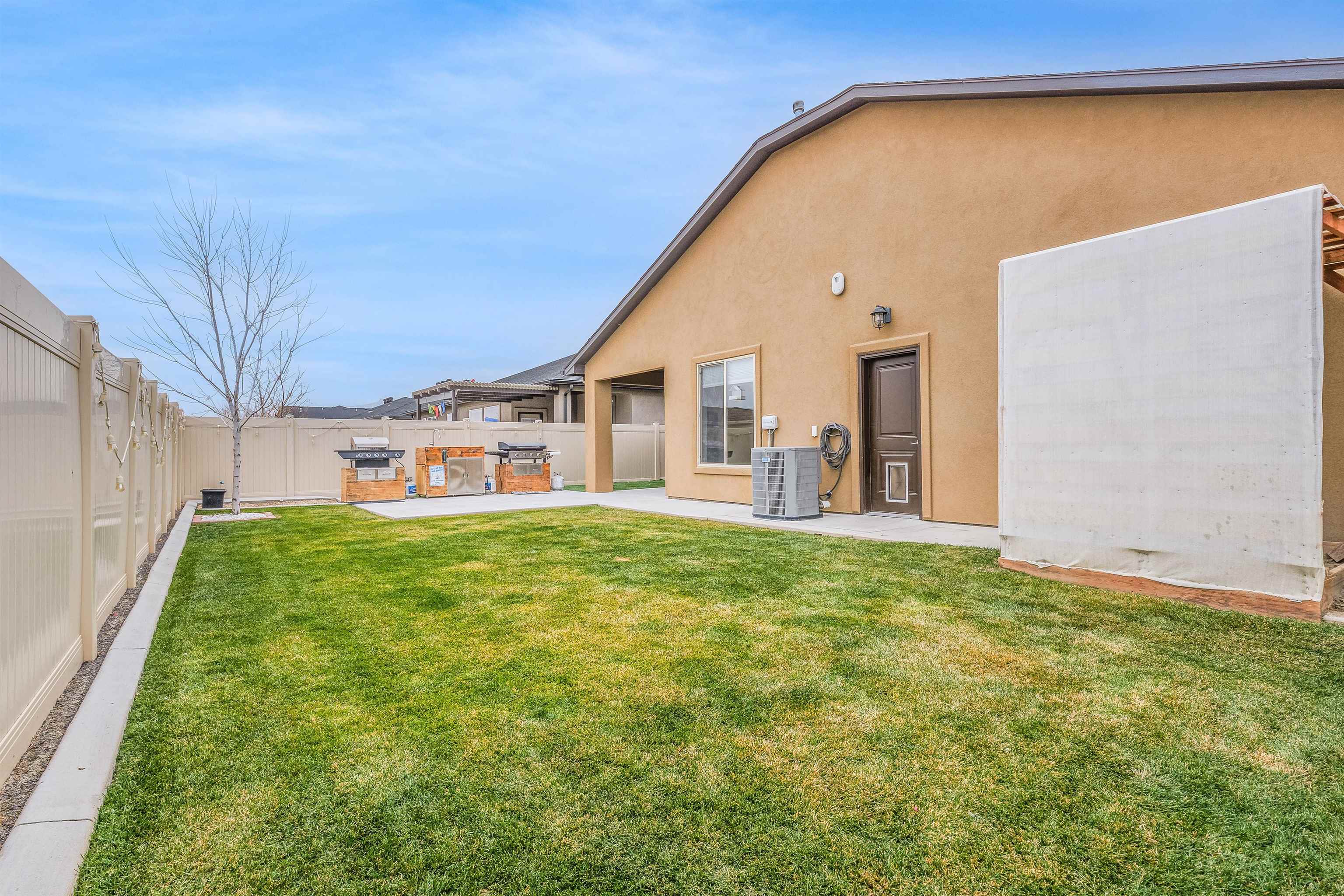 623 Thunder Ridge Drive Grand Junction, CO 81504 - Photo 37 of 40 a view of an house with backyard space and balcony