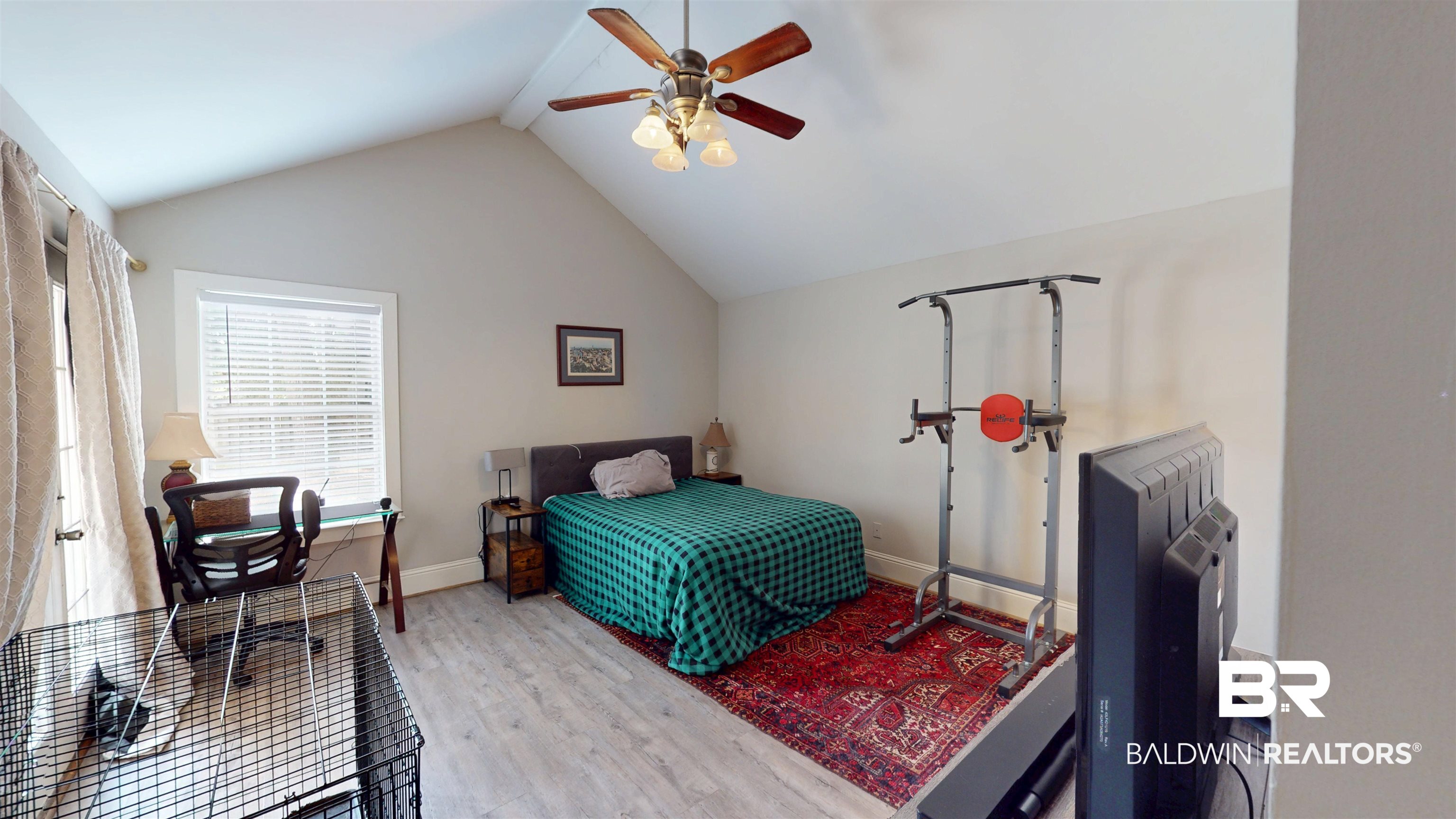 51 Bishop Lane South Mobile, AL 36608 - Photo 13 of 19 Bedroom featuring light wood-type flooring, a ceiling fan, and high vaulted ceiling
