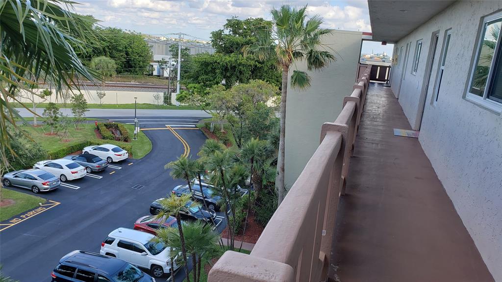 2216 North Cypress Bend Drive, Unit 504 Pompano Beach, FL 33069 - Photo 11 of 33 a view of a house with patio