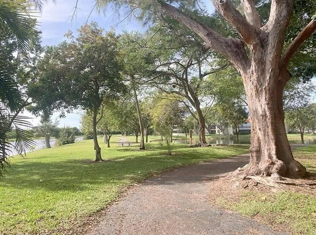 a view of an outdoor space and tennis court