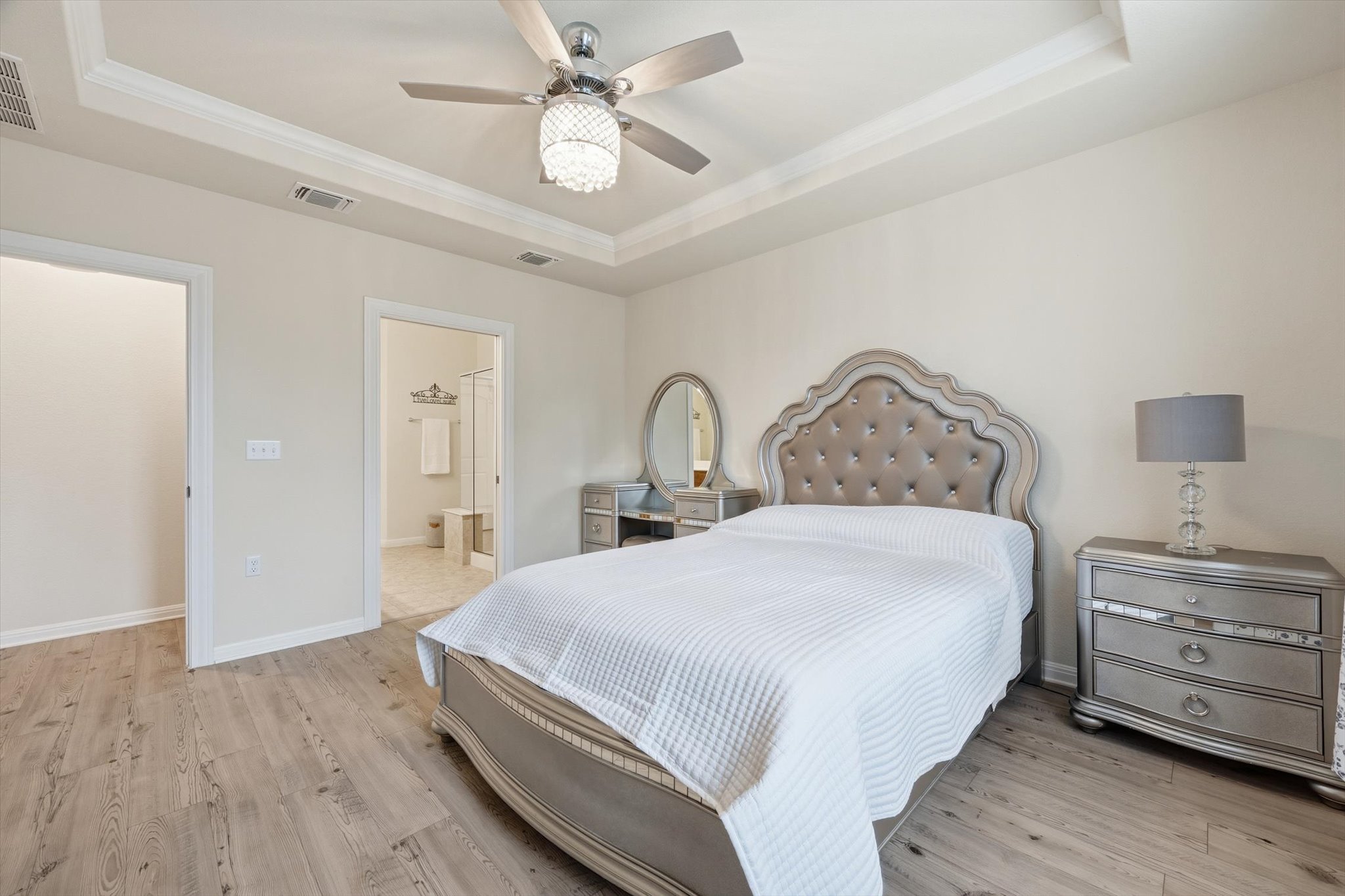 113 Lafayette Street Georgetown, TX 78633 - Photo 25 of 39 Tray ceiling with crown molding, wood-finish flooring, and recessed lighting