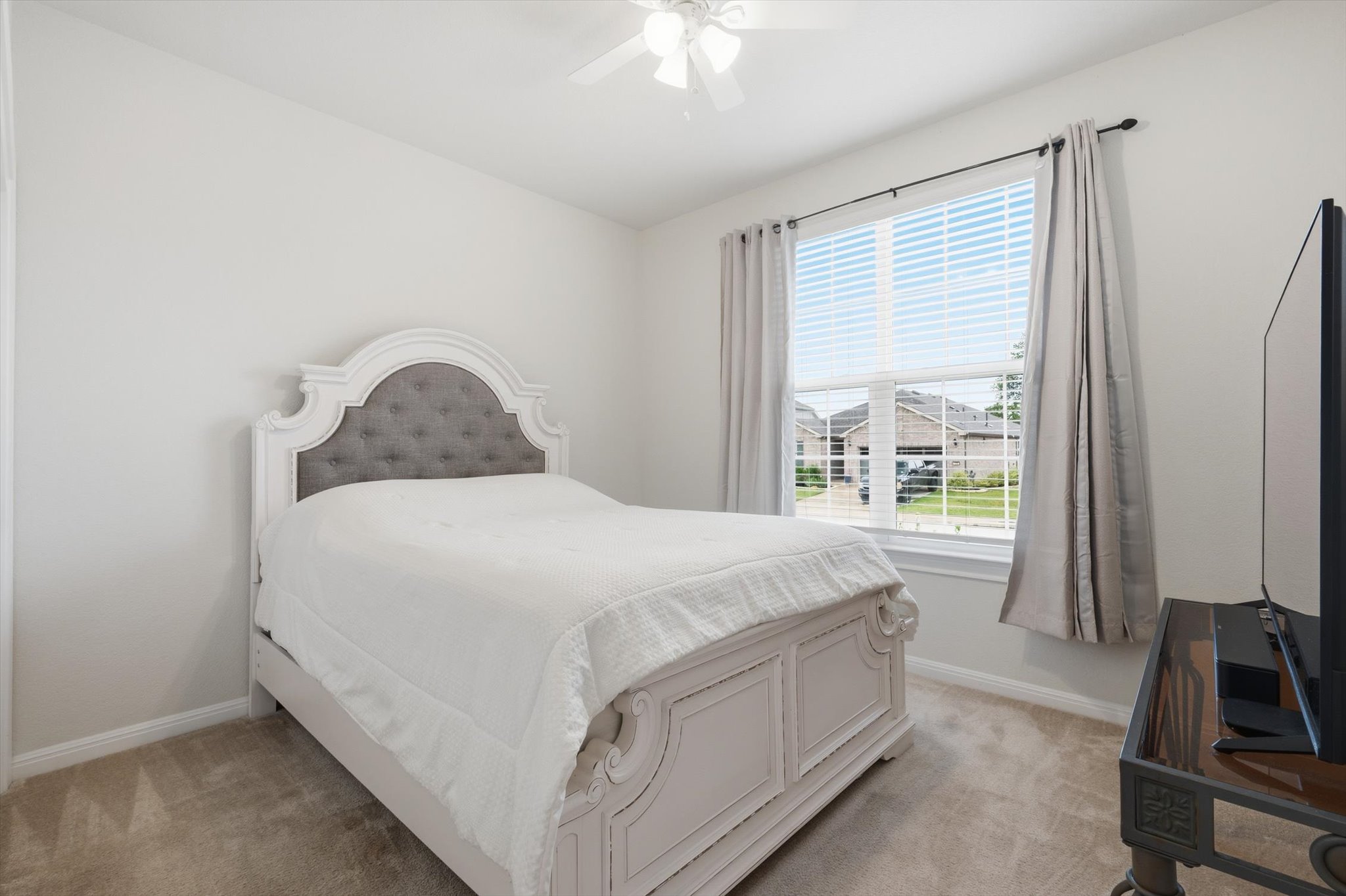 113 Lafayette Street Georgetown, TX 78633 - Photo 32 of 39 Secondary Bedroom at front of home.