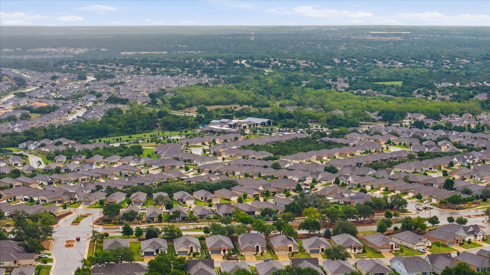 113 Lafayette Street Georgetown, TX 78633 - Photo 38 of 39 Aerial perspective showcasing a residential community with numerous single-story homes