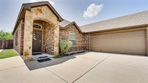 104 Anthony Lane Red Oak, TX 75154 - Photo 3 of 16 View of front of house featuring stone siding, driveway, and a garage