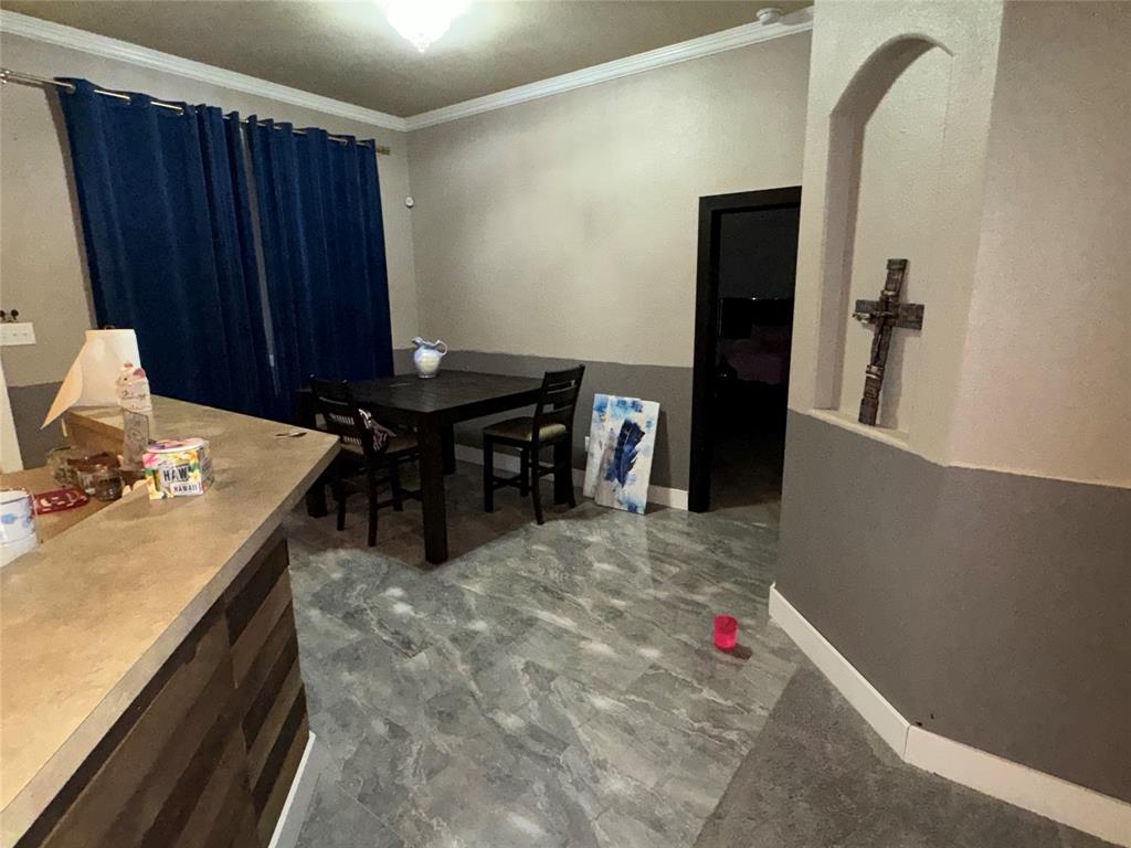 104 Anthony Lane Red Oak, TX 75154 - Photo 5 of 16 Dining space with ornamental molding and baseboards
