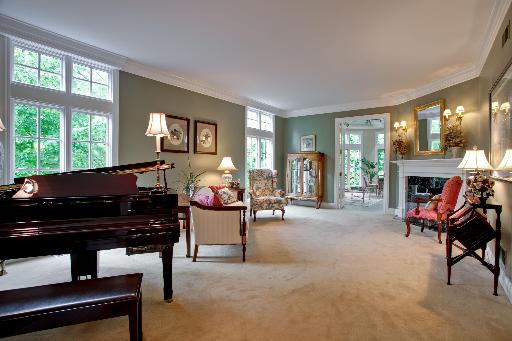 804 Cleveland Road Hinsdale, IL 60521 - Photo 2 of 16 a living room with furniture and a fireplace