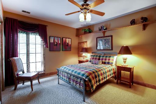 804 Cleveland Road Hinsdale, IL 60521 - Photo 12 of 16 a bedroom with a bed chair and a window