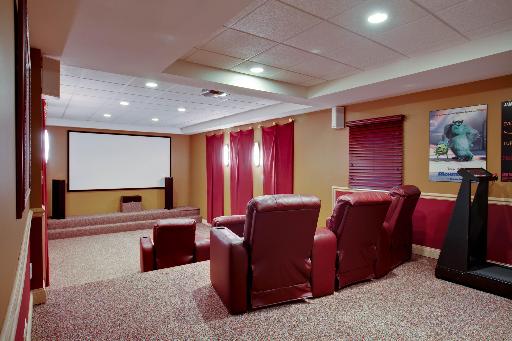 804 Cleveland Road Hinsdale, IL 60521 - Photo 14 of 16 a room with furniture and a flat screen tv