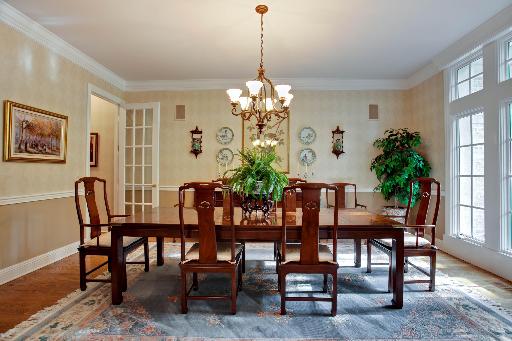 804 Cleveland Road Hinsdale, IL 60521 - Photo 3 of 16 a view of a dining room with furniture window and wooden floor