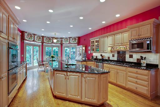 804 Cleveland Road Hinsdale, IL 60521 - Photo 7 of 16 a kitchen with sink a microwave and cabinets