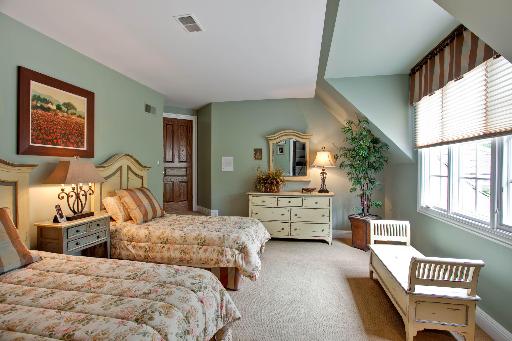 804 Cleveland Road Hinsdale, IL 60521 - Photo 10 of 16 a bedroom with two beds and a window