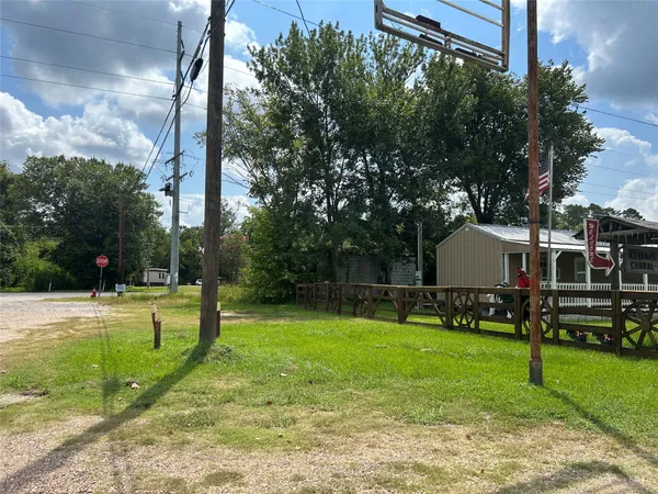 a view of a backyard with a slide