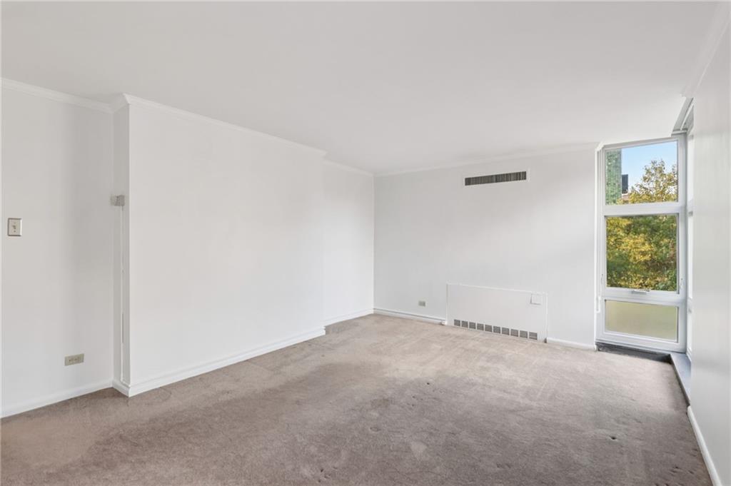 552 North Neville Street, Unit 21 Pittsburgh, PA 15213 - Photo 29 of 35 an empty room with windows