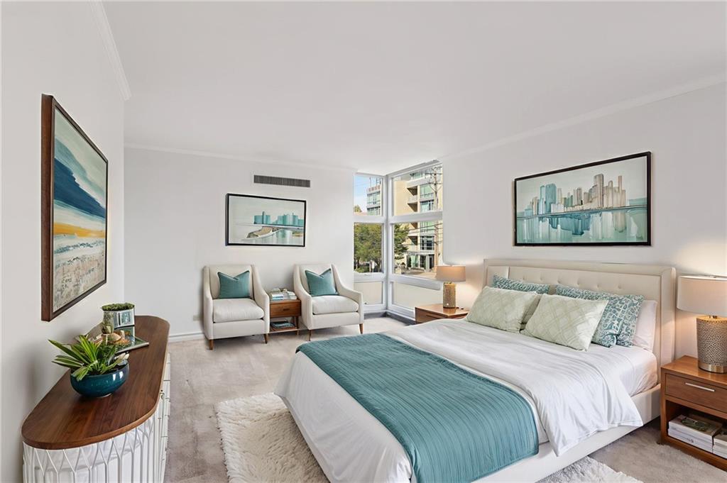 552 North Neville Street, Unit 21 Pittsburgh, PA 15213 - Photo 9 of 35 a bedroom with a bed and a couch