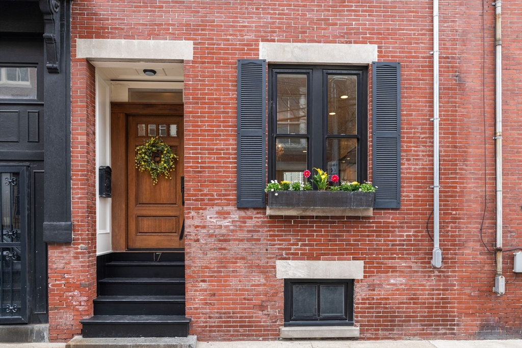 a front view of a house with an outdoor space