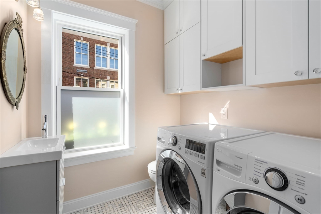 17 Walker Street Boston, MA 02129 - Photo 15 of 24 a utility room with dryer and washer