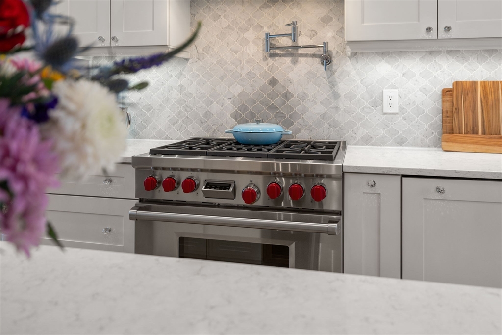 17 Walker Street Boston, MA 02129 - Photo 6 of 24 a stove top oven sitting inside of a kitchen