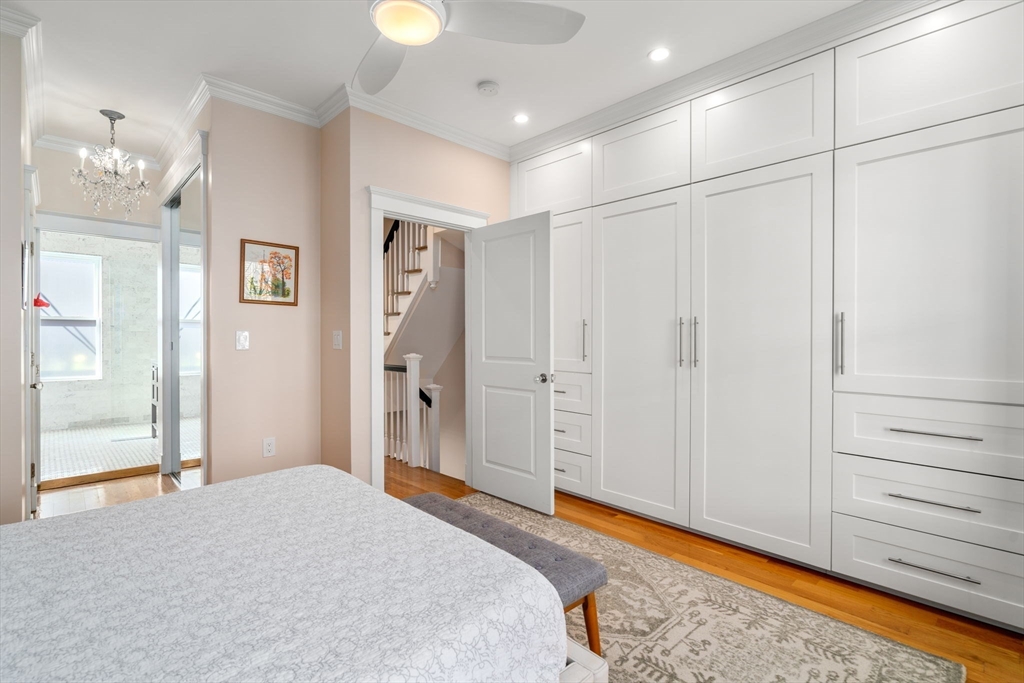 17 Walker Street Boston, MA 02129 - Photo 10 of 24 a bedroom with a bed and a window