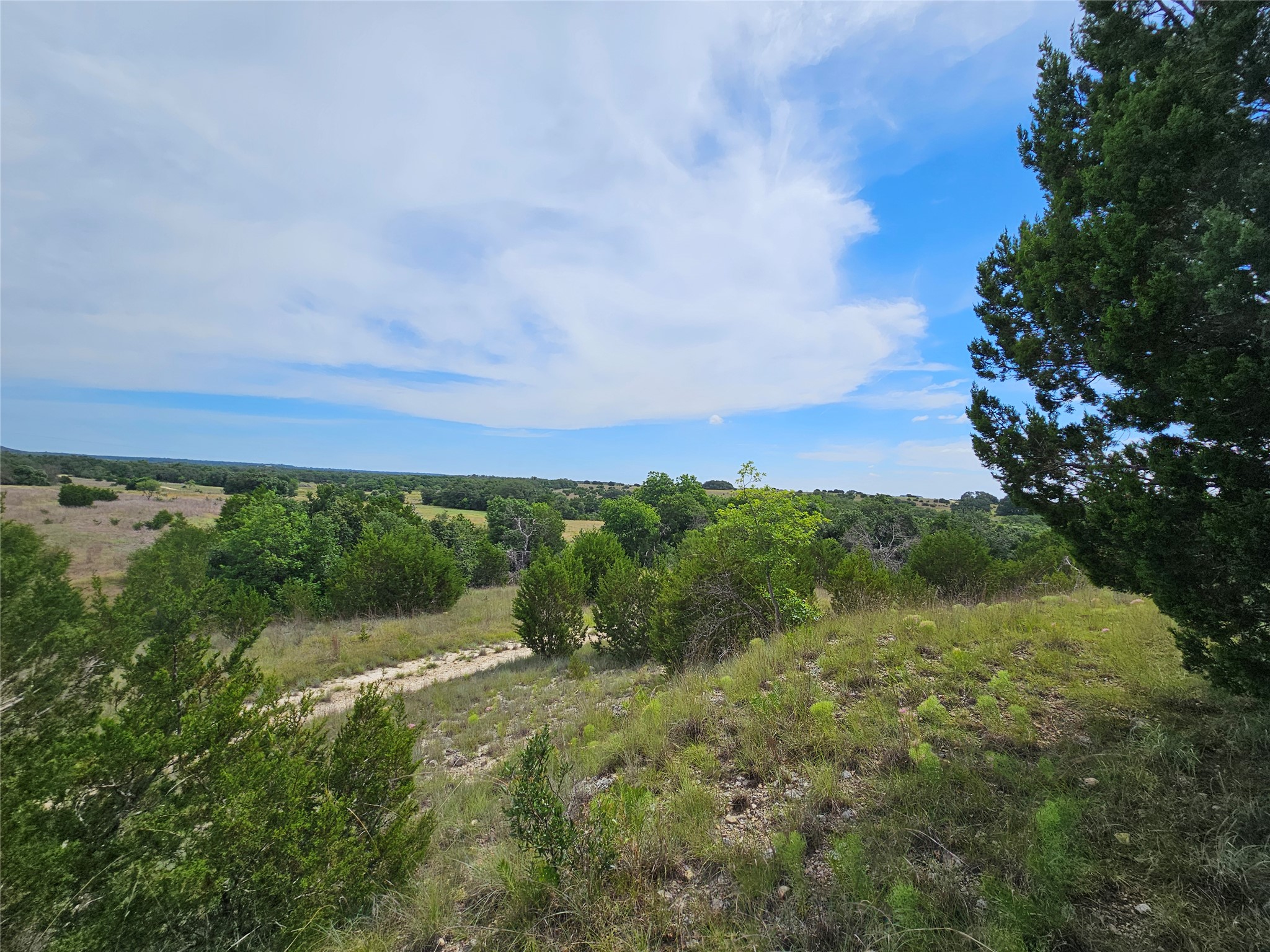 580 East 0123 Kempner, TX 76539 - Photo 1 of 15 Vast natural landscapes unfold beneath an expansive sky, inviting tranquil living.