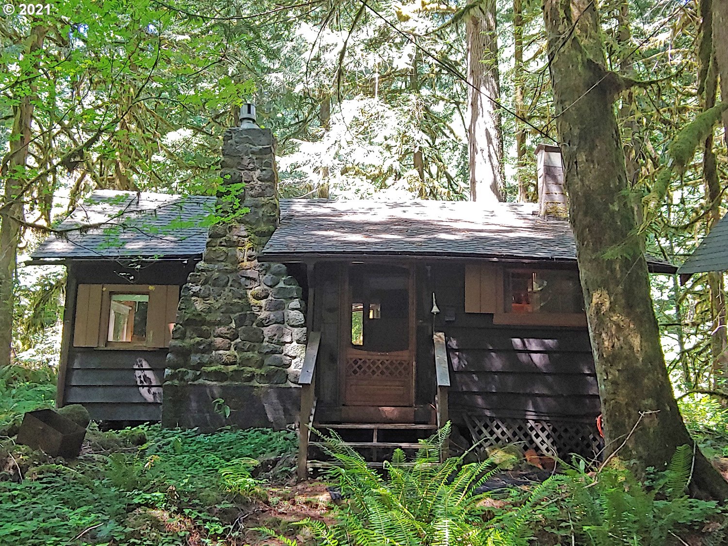 27525 Road 20 Rhododendron, OR 97049 - Photo 1 of 22 front view of a house with a tree