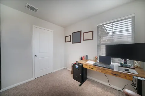 a room with furniture and window