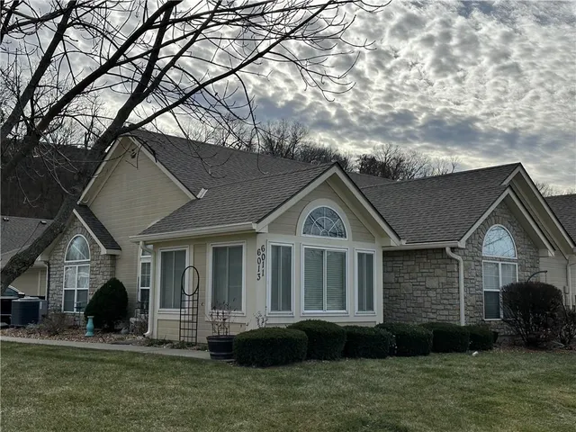 $310,000 | 6011 Northeast Kensington Drive, Lee's Summit, MO 64064