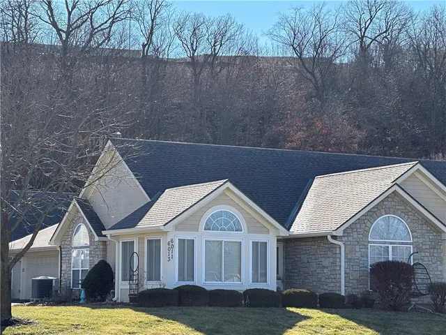 $310,000 | 6011 Northeast Kensington Drive, Lee's Summit, MO 64064