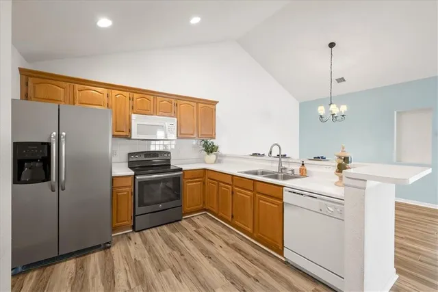 $310,000 | 6011 Northeast Kensington Drive, Lee's Summit, MO 64064