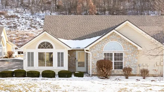 $310,000 | 6011 Northeast Kensington Drive, Lee's Summit, MO 64064