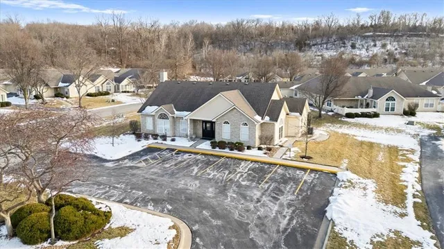 $310,000 | 6011 Northeast Kensington Drive, Lee's Summit, MO 64064