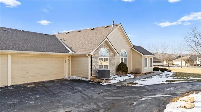 $310,000 | 6011 Northeast Kensington Drive, Lee's Summit, MO 64064