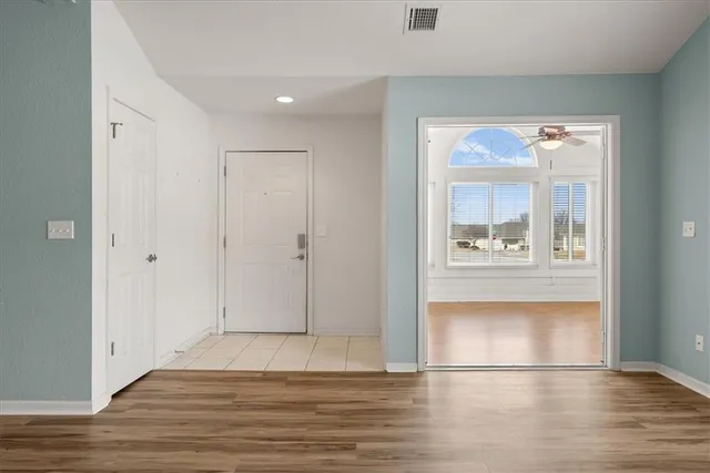 $310,000 | 6011 Northeast Kensington Drive, Lee's Summit, MO 64064