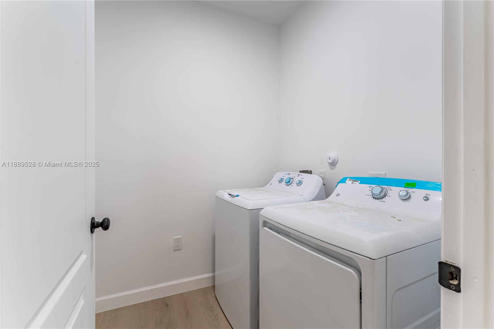 2575 Southwest 64th Avenue, Unit 7 Miramar, FL 33023 - Photo 13 of 13 a utility room with dryer and washer