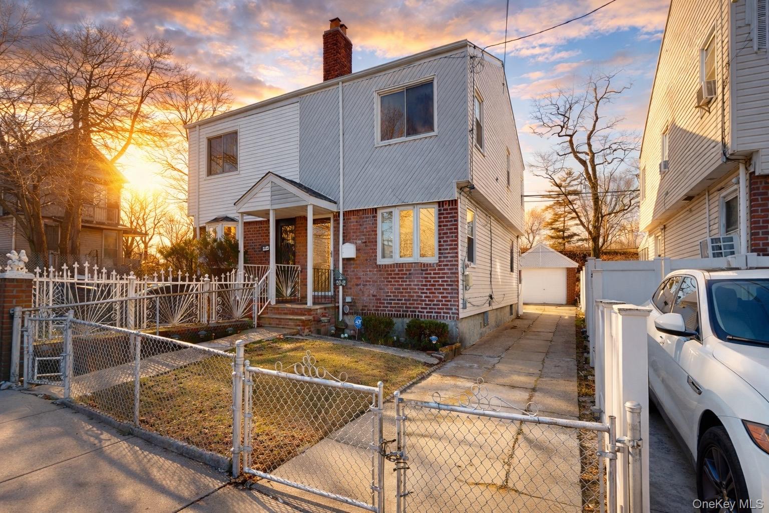 219-42 141st Road Queens, NY 11413 - Photo 1 of 23 a view of a house with tub and couches chair