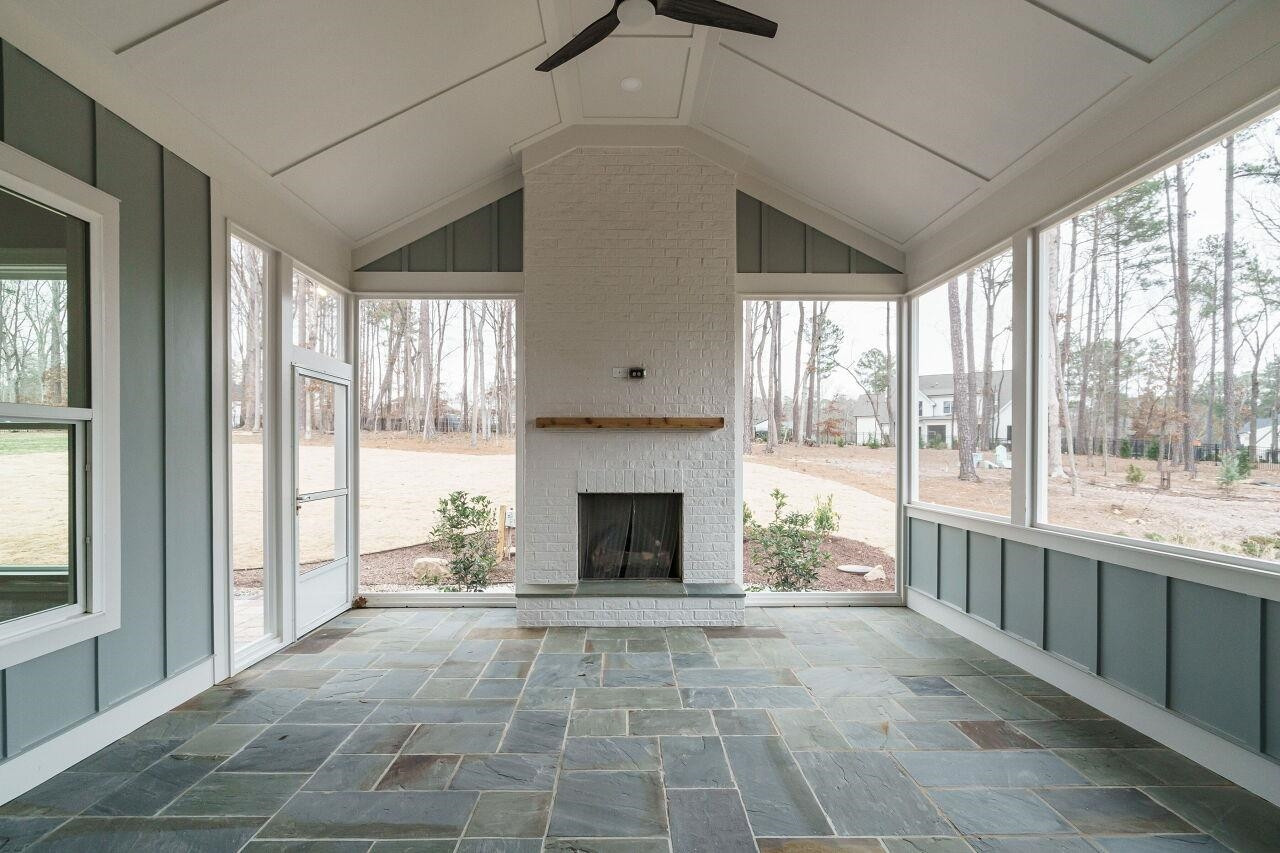 2125 Gardenbrook Drive Raleigh, NC 27606 - Photo 28 of 35 a living room with furniture and a fireplace