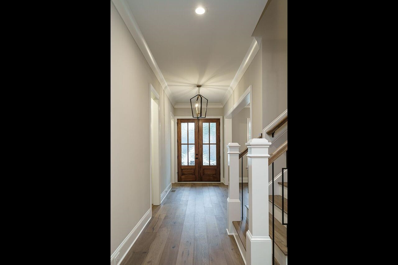 2125 Gardenbrook Drive Raleigh, NC 27606 - Photo 3 of 35 a view of entryway with wooden floor