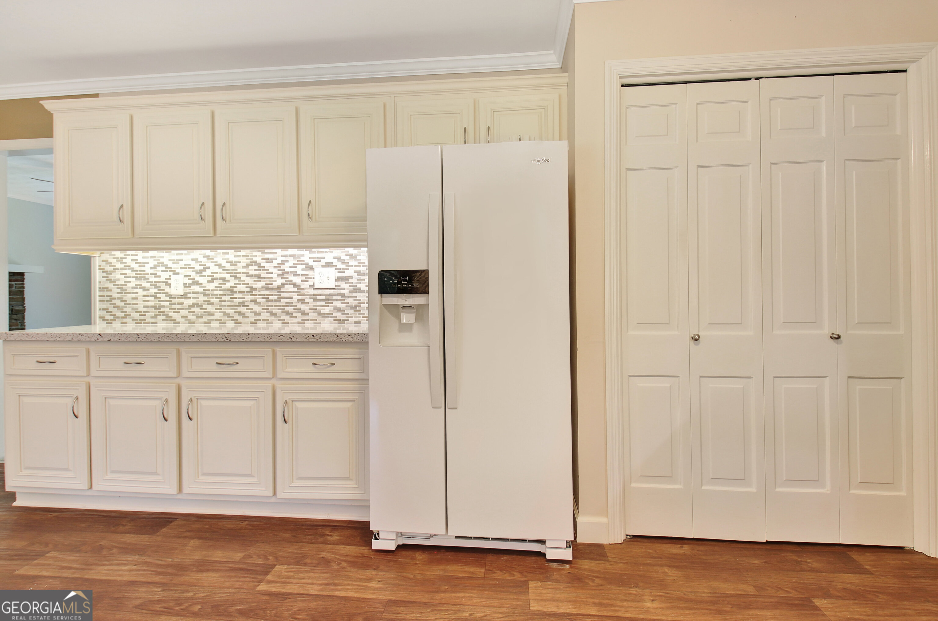 717 Tyrone Road Tyrone, GA 30290 - Photo 37 of 58 a view of a kitchen with white cabinets