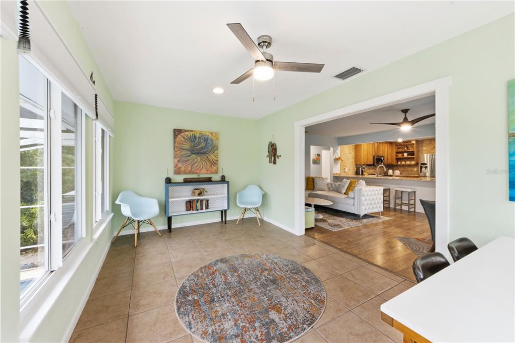 417 Poinsettia Road Anna Maria, FL 34216 - Photo 16 of 34 a living room with furniture and a large window