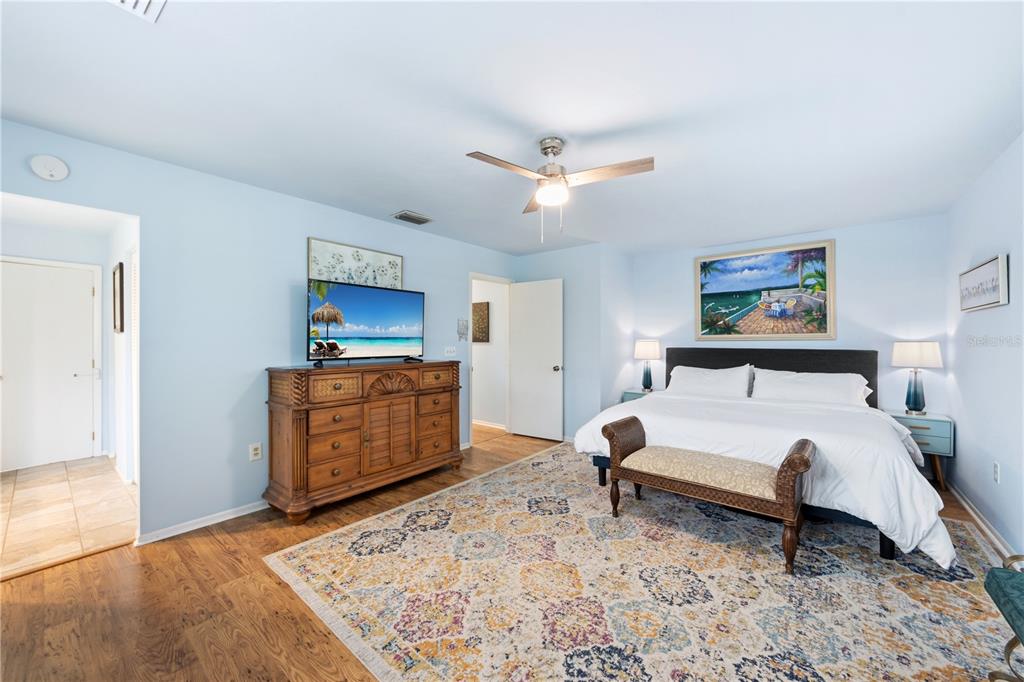 417 Poinsettia Road Anna Maria, FL 34216 - Photo 18 of 34 a bed room with a bed and a television