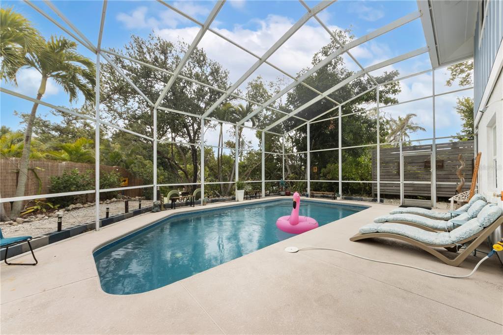 417 Poinsettia Road Anna Maria, FL 34216 - Photo 24 of 34 a view of swimming pool with lounge chair