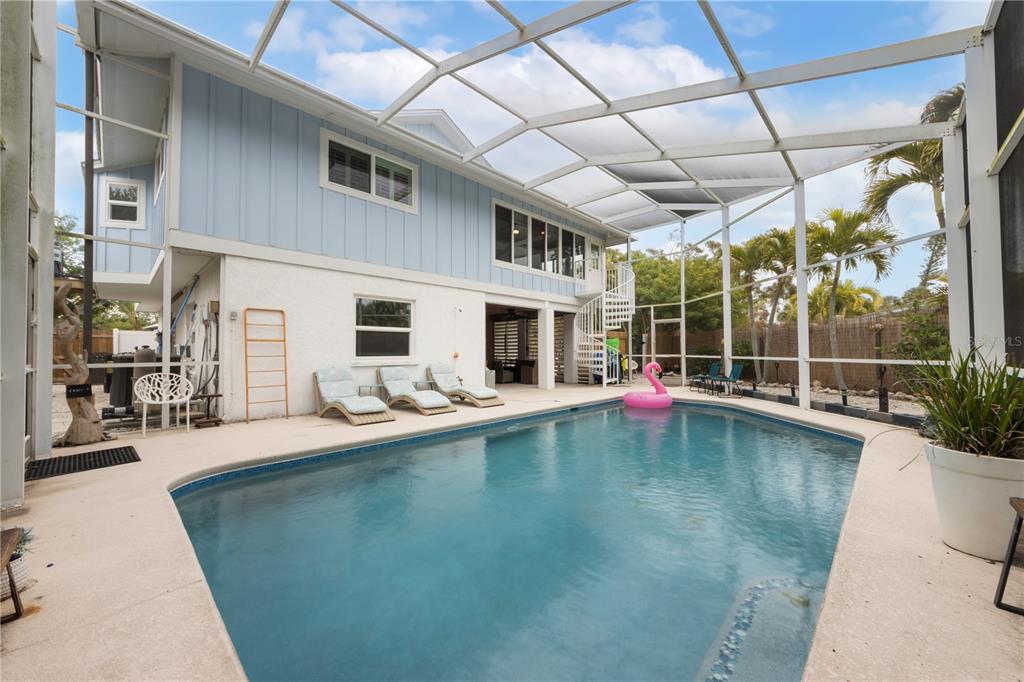 417 Poinsettia Road Anna Maria, FL 34216 - Photo 26 of 34 a view of swimming pool with outdoor seating