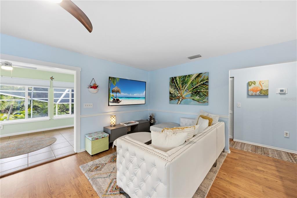 417 Poinsettia Road Anna Maria, FL 34216 - Photo 8 of 34 a living room with furniture and a window