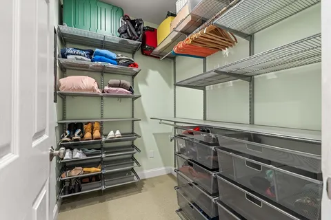 a kitchen with stainless steel appliances and cabinets