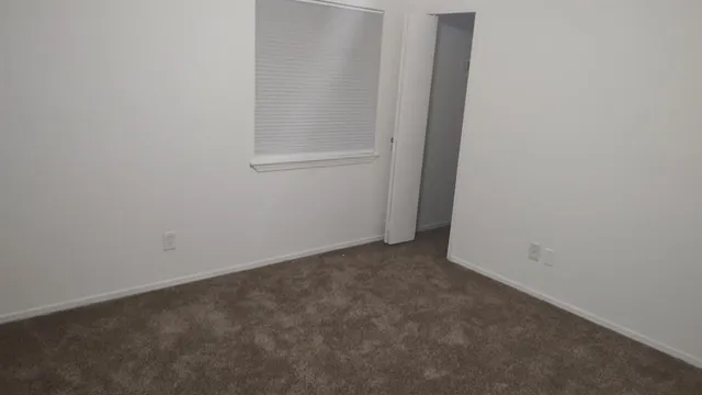 an empty room with closet