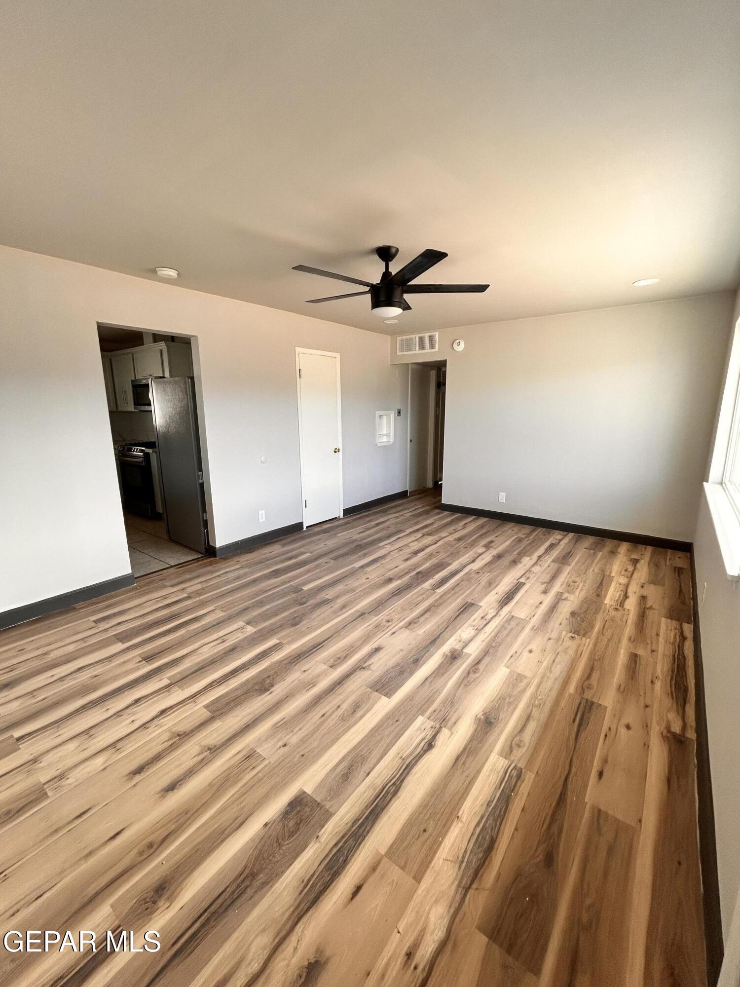 9104 Raleigh Drive El Paso, TX 79924 - Photo 8 of 20 a view of a livingroom with a staircase