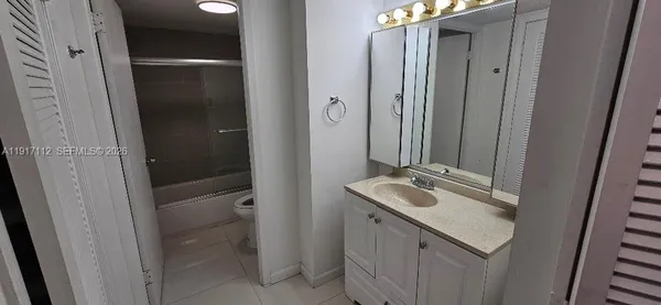 a view of a city with tall buildings